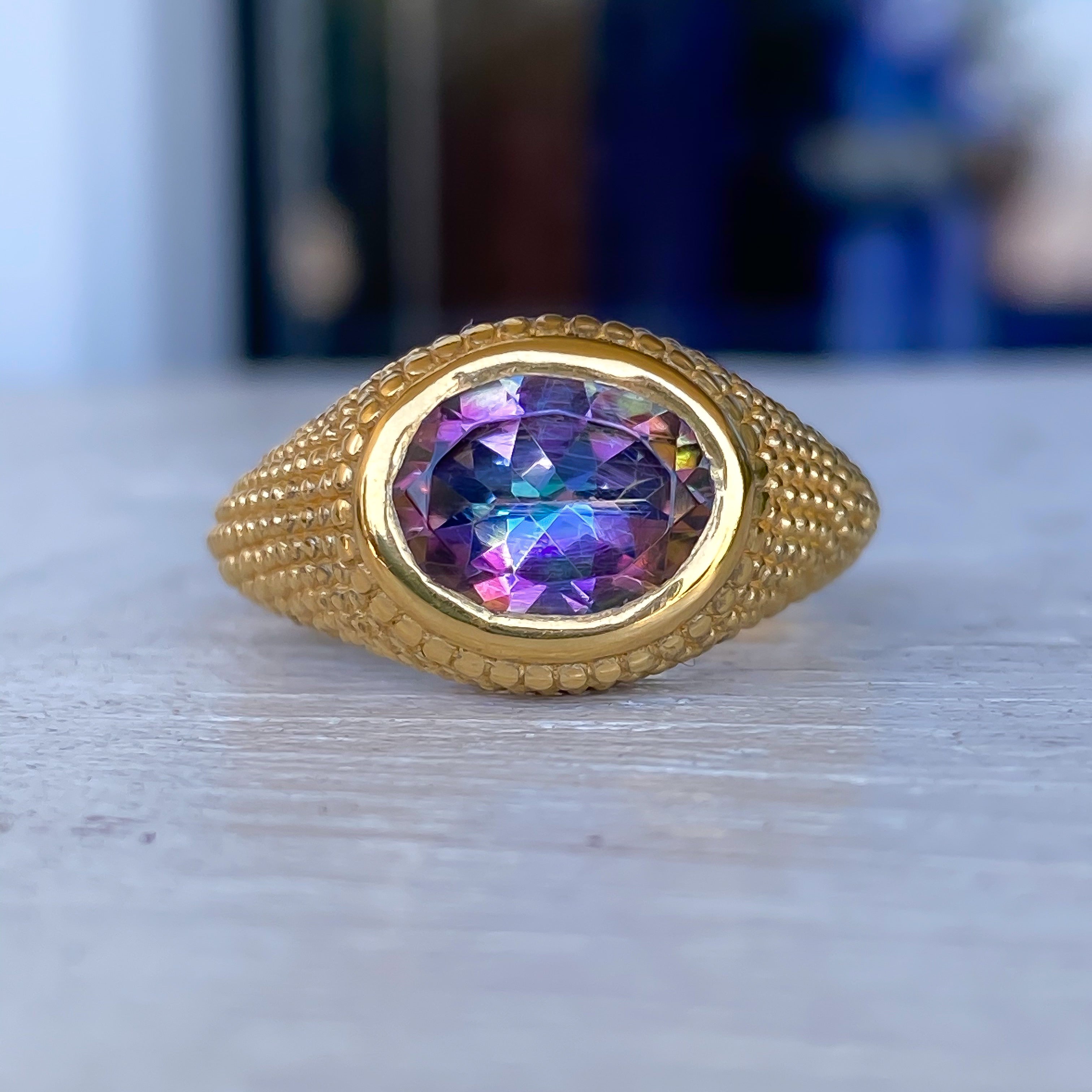 Nubia Oval Purple Mystic Topaz Yellow Gold Ring Size 7US - MANARI.eu
