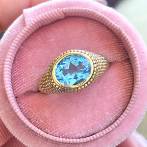 Nubia Oval Blue Topaz Yellow Gold Ring Size 7US - MANARI.eu