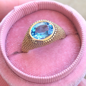 Nubia Oval Blue Topaz Yellow Gold Ring Size 7US - MANARI.eu